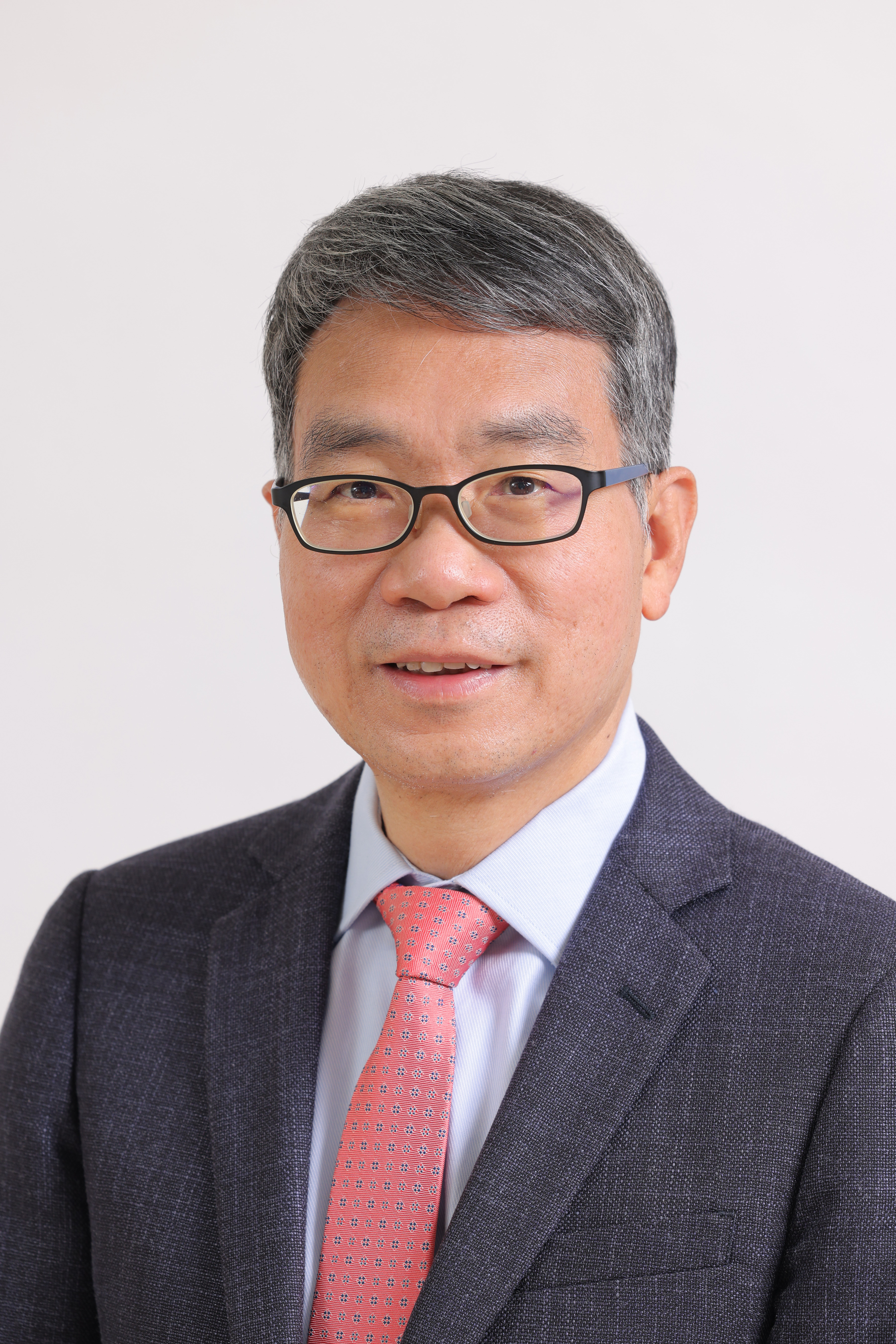 Professor Man Tak Yuen
